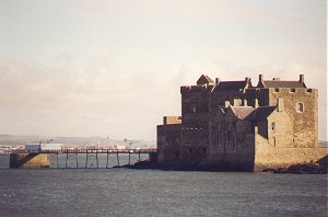 BLACKNESS CASTLE
 Jutting into the Firth Of Forth, 15th century, a keep with round stair tower. In 1537 the walls of the keep were thickened and gun emplacements built. Cromwell besieged and damaged the castle, Charles II later repaired it. Then used as a prison for distinguished covenanters, and others until 1707. It became a garrison fortress, until 1847 when it was converted for use as an ammunition depot.